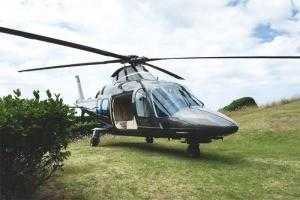 Agusta 109 Grand parked in the grass
