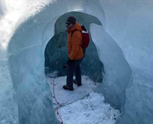 A man in and ice cave
