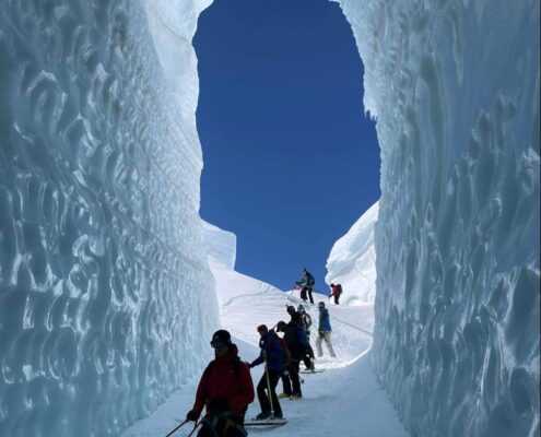 A ski group in an ice cave